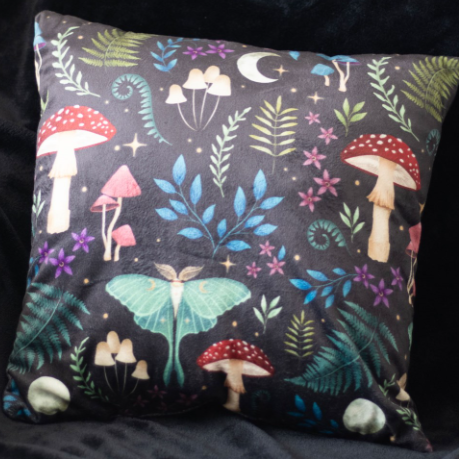 Square sofa cushion with a dark forest motif - fly agaric mushrooms, vintage fauna and luna moths.