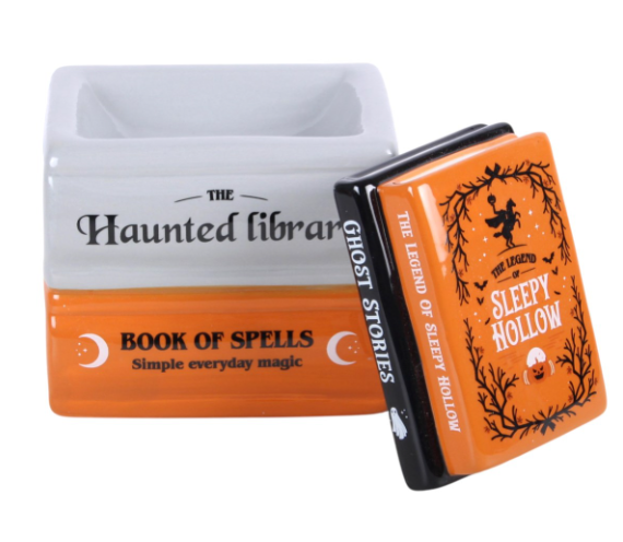 Wax Melter & Oil Burner shaped like a stack of spell books and ghost stories from the Haunted Library range.