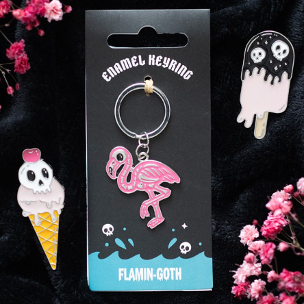 A flamigo-gothic style keyring featuring a skeleton flamingo.