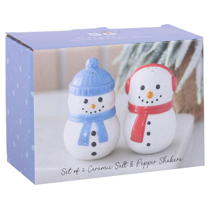 Pair of ceramic snowman shaped salt and pepper shakers, finished with complementing red and blue accessories. Presented in a themed box.