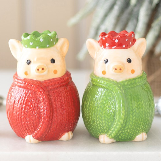 Adorable ceramic salt and pepper shakers designed as pigs wrapped in knitted blankets (Pigs in Blankets)