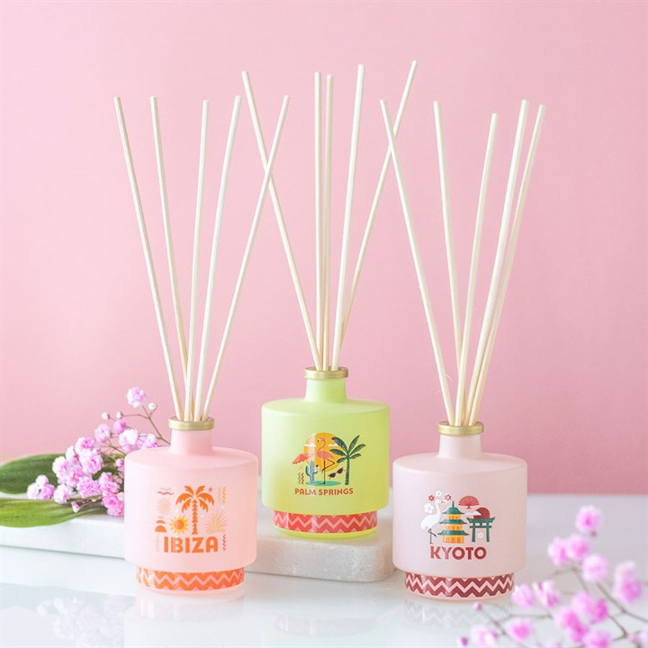 Kyoto bamboo and cherry reed diffuser, presented in a light pink bottle with Japanese city design. Includes reeds. Presented alongside other items from the same range. 