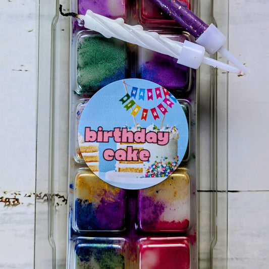 Birthday Cake coconut wax melt. White snap bar with red, purple, golden, pink, blue shimmer accents.