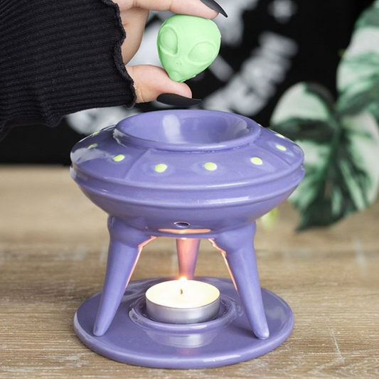 UFO shaped wax melter and oil burner with lime scented melt.