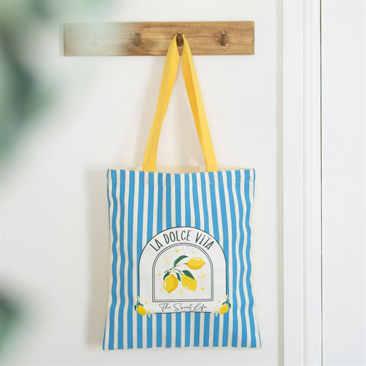 Blue and white striped La Dolce Vita canvas sustainable tote bag.