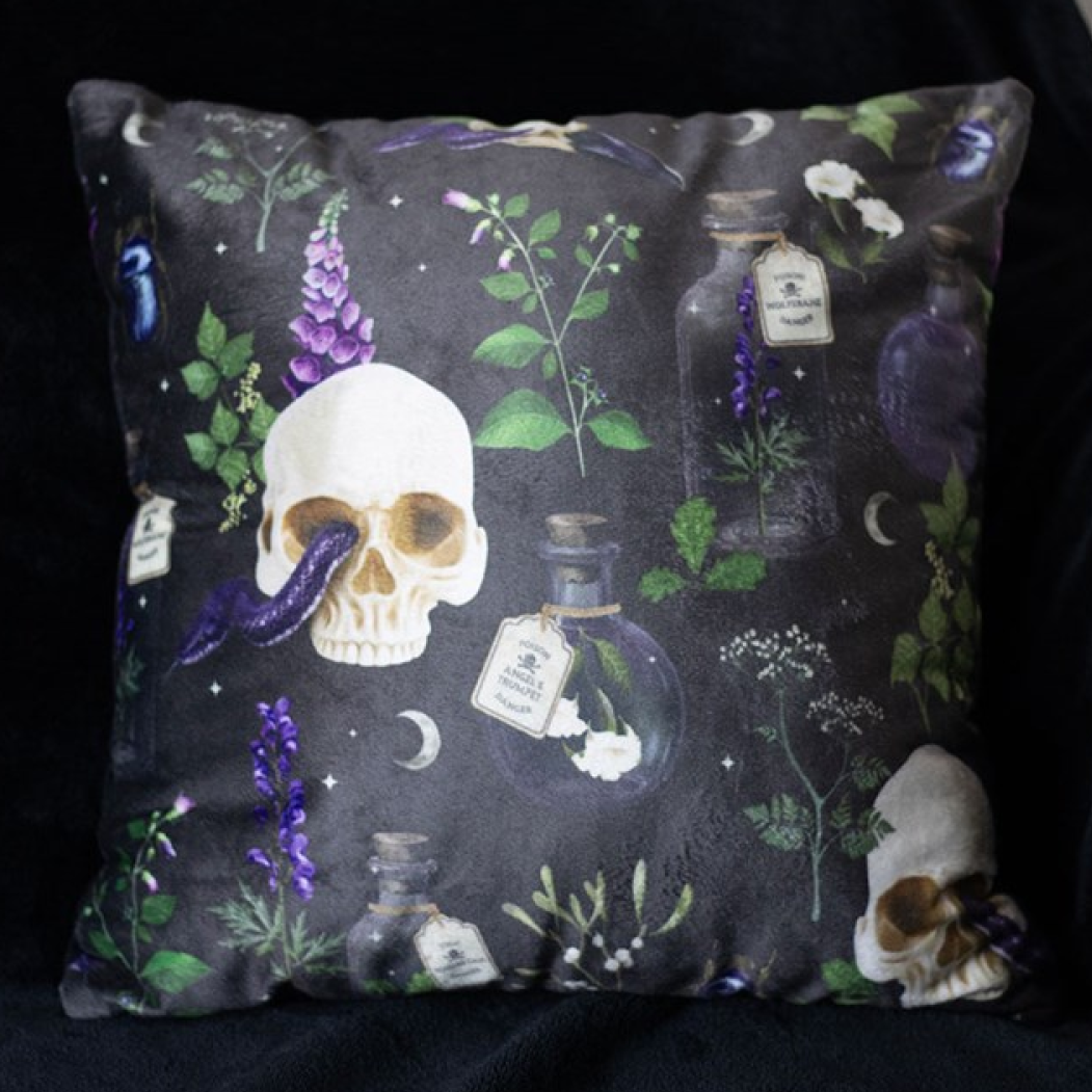 Square cushions with skulls, serpents and poisonous plants motif.