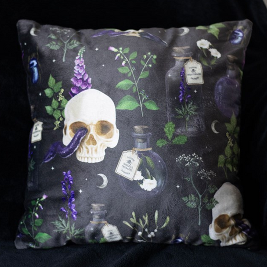 Square cushions with skulls, serpents and poisonous plants motif.