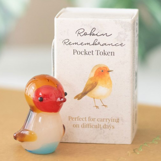 Glass robin shaped remembrance pocket token.