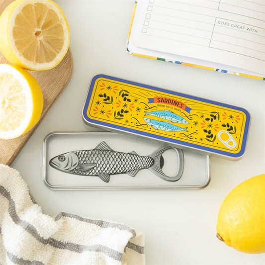 sardine-shaped bottle opener in a colourful metal tin