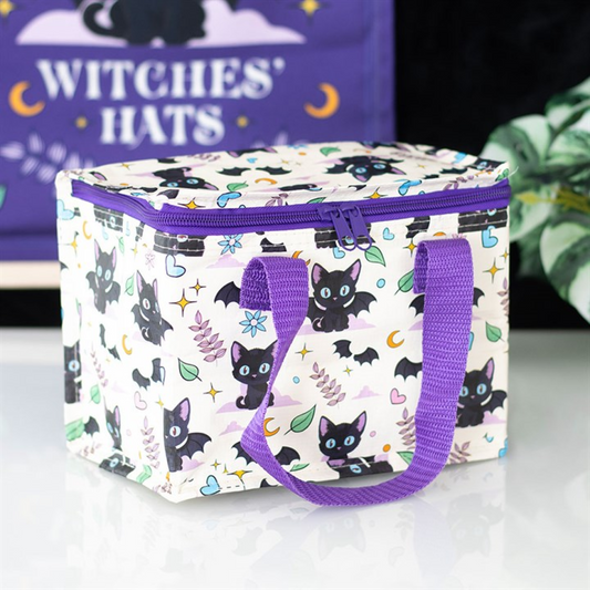 Insulated lunch bag with adorable cute and creepy cat pattern. 